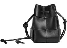 The Bottega Veneta Cassette Mini Intrecciato Bucket Bag encapsulates modern sophistication with a touch of artisanal charm. Skillfully crafted with meticulous attention to detail, it features the brand's iconic Intrecciato weaving technique, showcasing exquisite craftsmanship. The compact bucket silhouette offers a contemporary twist, while the Cassette motif adds a touch of elegance. With its versatile design and adjustable strap, this bag seamlessly transitions from day to night, making it per Bottega Veneta Cassette, Balenciaga Designer, Bottega Veneta, Luxury Bags, Designer Shoes, Bucket Bag, Timeless Fashion, Bags Designer, Adjustable Straps