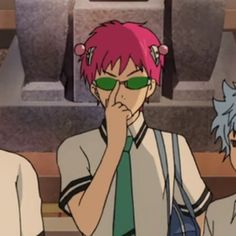 two young men with pink hair and green glasses