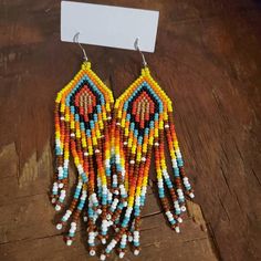 Turquoise beaded earrings in Native American styleDangling | Etsy Southwestern Multicolor Fringe Earrings, Dangle Beaded Earrings With Fringe For Crafting, Fringe Round Beads For Diy Jewelry Making, Beaded Earrings Native American, Jewelry Mexican, Turquoise Bead Earrings, Blue Beaded Earrings, Earrings Native American, Stitch Earrings