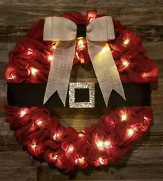 a christmas wreath with lights on it