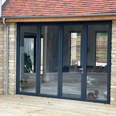 metal-folding-patio-door-clear-glass-4-panels Steel Patio Doors, Glass Bifold Doors, Wrought Iron Entry Doors, Bifold Door, Iron Entry Doors, Bi Fold Door, Modern Entry, Door Sweep, Bungalow Renovation