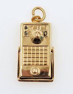 Vintage 1960 Handmade 14K Yellow Polished Gold Movable Transistor Necklace Charm Unisex   Pendant This pendant is in excellent condition, it would make a great gift.   The pendant length approx.: 21.2mm (not including bail) The pendant width approx.:11.4 mm  Charm thickness approx.: 4.2mm Pendant weight: 3.1g Hallmarks:  14K Will be placed into a suitable gift box Free shipping within the U.S. Mid-century Gold Necklace Gift, Retro Gold Engraved Jewelry, Retro Engraved Gold Jewelry, Retro Yellow Gold Jewelry, Mid-century Gold Jewelry For Formal Occasions, Retro Gold Jewelry Stamped 14k, Necklace Charm, Pendant Necklaces, Charm Necklace