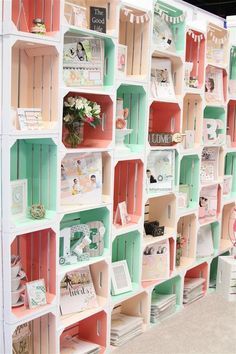 the shelves are filled with cards and pictures