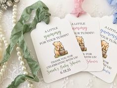 three tags with the words little mommy for your baby on them next to pearls and ribbon