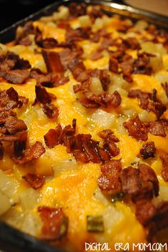 a casserole dish with bacon and cheese on it