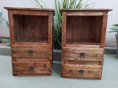 two wooden drawers sitting next to each other