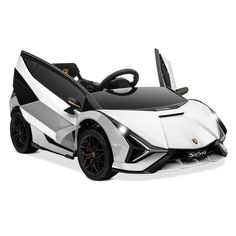 a white and black toy car on a white background