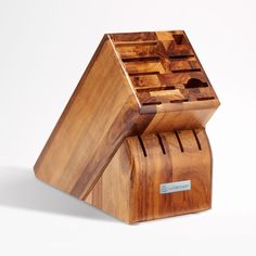 a wooden box that has some sort of object on it's side and is made out of wood