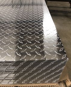 several metal sheets stacked on top of each other