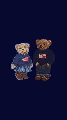 two teddy bears dressed in clothes with american flags on them, standing next to each other