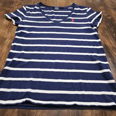 Ralph Lauren Sport V-Neck Blue & White Striped Polo Tee Shirt Women's Size S/P Excellent Condition With No Visible Signs Of Wear; Ie. No Rips/Tears/Stains. Could Be New Without Tags. Striped Cotton V-neck T-shirt, Blue Ralph Lauren Cotton Tops, Blue Ralph Lauren Crew Neck T-shirt, Navy Ralph Lauren Short Sleeve Tops, Ralph Lauren Navy Short Sleeve Tops, Navy Short Sleeve Ralph Lauren Top, Navy Casual V-neck T-shirt, Ralph Lauren Navy Casual Tops, Ralph Lauren V-neck Casual Top