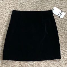 This Adorable Black Velour Skirt Is New With Tags! There Is Some Loose Stitching On The Back At The Bottom Of The Zipper But It Doesn’t Impact Wear. I’m Still Able To Zip It Up And Down And Nothing Shows! There’s Just Some String That Needs To Be Cut Or Sewn Down. Really Hardly Noticeable (Last Pic) Zara Black Lined Mini Skirt, Zara Black Mini Length Skort, Zara Black Mini Skort, Zara High Waist Black Skirt, Zara Black Stretch Mini Skirt, Zara Black Pencil Skirt, Zara Black Mini Skirt, Velour Skirt, Zara Skirts