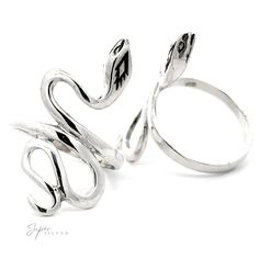 This silver snake ring is sure to slither its way into your heart. Coiled and ready to strike, this serpent is a perfect picture of charm and confidence—with just a touch of underlying danger. This delicate ring is an excellent testament to its wearer's inner strength and ferocity. Because of its simplicity, this ring pairs perfectly with any look, whether you're a snake lover or simply looking for the courage of one. Material: .925 Sterling Silver Dimensions: 2mm band, 30mm snake height Silver Snake-shaped Promise Ring, Silver Metal Snake-shaped Ring, Adjustable Silver Nickel-free Snake Ring, Adjustable Nickel-free Silver Snake Ring, Adjustable Metal Snake Ring, Unique Sterling Silver Snake Ring, Silver Snake Ring For Promise, Adjustable Symbolic Snake-shaped Jewelry, Adjustable Silver Snake-shaped Ring