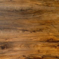 a close up view of the wood grains on a table top, with some stains