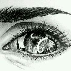 an eye with the reflection of a city in it