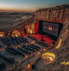 an outdoor movie theater in the middle of desert