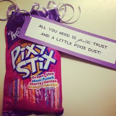 a candy bag with a sign attached to it that says, all you need is just trust and a little pixe dust