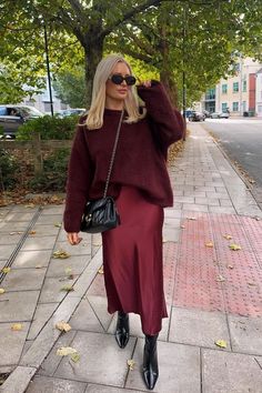 Fall 2024 Burgundy Outfits, Color Work Outfits Women, Outfits With Red Skirts Winter, Christmas Markets Outfit Ideas, Red Cardigan Skirt Outfit, Burgundy On Burgundy Outfit, All Maroon Outfit, Silk Dress And Sweater Outfit, Christmas Church Outfits For Women