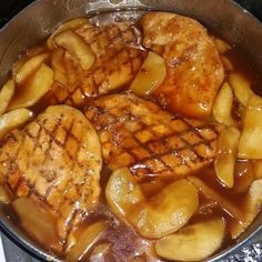 some food is cooking in a pan on the stove