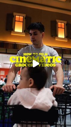 a man standing next to a baby in a shopping cart