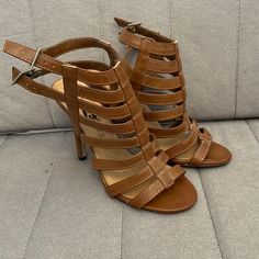 Never Worn Rue 21 Gladiator Brown Heel Sandals Size 7/8m Chic Strapped Summer Heels, Chic Strapped Synthetic Sandals, Strapped Heels With Buckle Closure For Summer, Casual Strappy Heels With Buckle Closure, Strapped Heels With Buckle Closure, Brown Strappy Heels With Buckle Closure, Brown Strappy Synthetic Heels, Brown Strappy Heels For Spring, Brown Sandals Heels