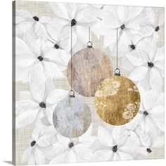 three ornaments hanging from strings on a white and beige floral canvas wall art print by person