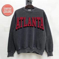 "comfort colors Atlanta Football sweatshirt, Atlanta Football Shirt, Atlanta Football Gift, Atlanta Sunday Football -Please check Color and Size Charts before placing the order. You can find them in the listing's photos (Depending on what device you are viewing this listing colors may vary slightly). -Returns and exchanges are accepted only if there are defects \"No Extra Costs\" We create custom t-shirts with great designs for everyone's liking. If you don't find the size or color you would like, please message us and we will be happy to  accommodate! comfort colors Atlanta Football sweatshirt, Atlanta Football Shirt, Atlanta Football Gift, Atlanta Sunday Football PRODUCT Sweatshirt Comfort Colors® 1566     80% ring-spun cotton, 20% polyester     Medium-heavy fabric (9.5 oz /yd² (322.1 g/ Oversized Fan Apparel Sweatshirt For College, Oversized College Sweatshirt For Fan Apparel, Casual Soft-washed Sweatshirt For College, Oversized Cotton Sweatshirt Fan Apparel, Comfortable Cotton Sweats With Letter Print, Casual Crew Neck Hoodie With Letter Print, Oversized Crew Neck Hoodie With Lettering, Relaxed Fit Crew Neck Hoodie For College, Oversized Comfortable Sweatshirt With Letter Print