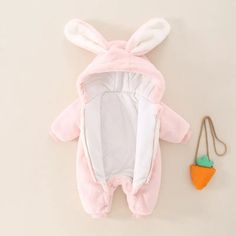 Introducing our Long Rabbit Ears Hooded Baby Romper, the perfect blend of style, comfort, and warmth for your little one. This adorable romper is not just cute; it's also incredibly stylish and versatile. Whether it's for everyday wear or a thoughtful gift for a baby, this romper is designed to impress. One of its standout features is the long rabbit ears on the hood, adding an irresistibly charming touch to your baby's outfit. These ears not only look cute but also help keep your baby's head wa Cute Long Sleeve Soft Onesie, Cute Soft Long Sleeve Onesie, Winter Long Sleeve Bubble Romper For Playtime, Cute Hooded Onesie For Playtime, Cute White Hooded Onesie, Winter Pink Onesie For Playtime, Winter Playtime Pink Onesie, Pink Bunny Clothes, Pink Winter Onesie For Playtime