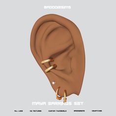 the ear is made up of gold colored metal and has two rings attached to it