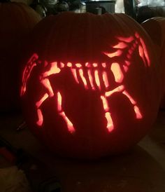 a pumpkin carved to look like a horse