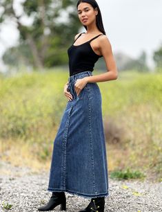 With a flair for style, the Royal Denim Maxi Skirt from Wash Lab Denim delivers. Beautiful flattering on top/flowing body cut, premium denim, and pocket/button-front detail. The cover model is 5'9" wearing a size 26 Fabric: 95% Cotton 4% Polyester 1% Spandex Length: 39" from waist Casual Flared Dark Wash Denim Skirt, Casual Dark Wash Flared Denim Skirt, Wide Leg Denim Skirt In Medium Wash, Medium Wash Wide Leg Denim Skirt, Medium Wash Denim Wide Leg Skirt, Chic Dark Wash Mid-rise Denim Skirt, Chic Dark Wash Denim Skirt With Pockets, Dark Wash Full Length Denim Skirt, Full Length Dark Wash Denim Skirt