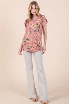 Floral Elegance Meets Effortless Comfort: Soft Knit Jersey Top with Flutter Sleeves Embrace Casual Chic with Floral Flourish Elevate your casual wardrobe with our Floral Print Top, crafted in soft knit jersey with charming flutter sleeves. This versatile piece effortlessly combines floral elegance with the comfort of a loose fit. Stylish and Relaxed Style: CasualPerfect for a laid-back yet stylish look, this Floral Print Top is an essential addition to your casual wardrobe. Embrace a relaxed vib Stretch Rayon V-neck Blouse, Spring Cotton Blouse With Flutter Sleeves, Feminine Flutter Sleeve Top With Ruffle Hem, Feminine Ruffle Sleeve Tops For Brunch, Spring Floral Print Tops With Flutter Sleeve, Spring Feminine Non-stretch Blouse, Elegant Spring Tops With Flutter Sleeves, Elegant Flutter Sleeve Tops For Spring, Trendy Stretch Tops With Ruffle Hem