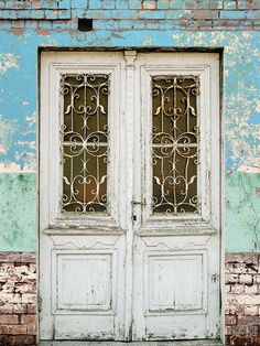 Rustic Vintage Door Photography Backdrop - Photography backdrop featuring a rustic wooden door with wrought iron details and a distressed pastel-colored wall Door Backdrop, Portable Backdrop, Door Backdrops, Door Photography, Distressed Walls, Paper Backdrop, Peeling Paint, Vinyl Backdrops, Printed Backdrops