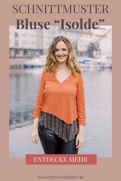 a woman standing in front of water with the words schntimuster bluse is