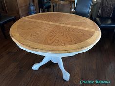 a wooden table sitting on top of a hard wood floor