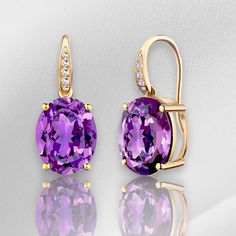 💎 Jewelry Details: *Metal: 14K Solid Gold *Gemstone:    - Type: Amethyst    - Cut: Oval    - Color: Purple    - Clarity: Eye-Clean    - Size: 8 x 10 mm    - Total Carat Weight (CTW): 6.00 *Diamonds:    - Color: Gold   - Clarity: VS    - Total Carat Weight (CTW): 0.05 *Measurements:    - Length: 3/4 inch    - Width: 1/2 inch 🪄 Oval-Cut Meaning:  The Oval-Cut is known for its elegant, elongated shape and exceptional brilliance. Characterized by its smooth curves, this cut maximizes the gemstone' Oval Amethyst Earrings With Gemstone Accents, Purple Oval Fine Jewelry Earrings, Purple Oval Earrings With Gemstone Accents, Convertible Earrings, Gold Diamond Drop Earrings, Diamond Drop Earrings, Diamond Drops, Solid Gold, Jewelry Earrings Dangle