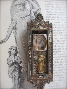 an antique clock with the image of mary and jesus in it