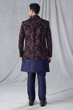 Blue front open jacket with all over floral, scallop embroidery. Paired with an inner sleeveless kurta. Comes along with a pant. - Aza Fashions Fitted Blue Outerwear For Designer Wear, Blue Fitted Outerwear For Designer Wear, Fitted Long Sleeve Traditional Wear With Motifs, Festive Fitted Outerwear With Multicolor Embroidery, Blue Long Sleeve Sets With Motifs, Designer Long Sleeve Bandhgala With Motifs, Fitted Sherwani With Multicolor Embroidery And Long Sleeves, Fitted Blue Nehru Jacket For Fall, Festive Blue Outerwear With Floral Embroidery