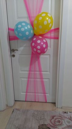 some balloons are tied to the front door