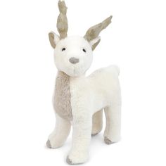 a white stuffed animal with horns on it's head and tail, standing upright