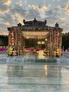 an outdoor stage set up for a wedding