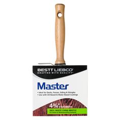 a wooden spatula with the words master written on it and a wood handle in front