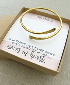 "\"True friends are never apart. Maybe in distance, but never in heart!\" This brass bangle bracelet is such a classic piece! Wear it yourself or send one to a special friend. May the overlapping pieces remind you of close friendship even at a distance This item comes in a Tiny Tokens gift box. We can also include a gift note if you're shipping directly. Just include your message in the \"Notes\" section at check out. This bracelet is 100% brass and wears with a chic naturally tarnish! Not into Bracelet Bff, Moving Gift, Bff Gift, Moving Gifts, Gift Bracelet, Brass Bangle, Bff Gifts, Box Gift, Special Friend