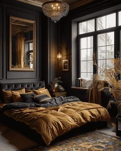 a bedroom with black walls, gold bedding and a chandelier hanging from the ceiling