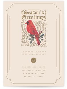 a christmas card with a red bird on it's front and the words season's greetings written in gold