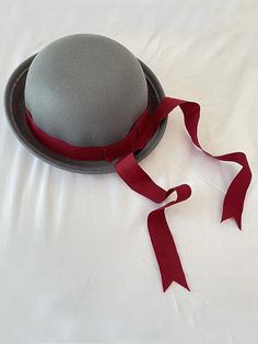 We know your princess is already cute but this satin bowknot bowler hat will make it even more charming. Featuring a popular silhouette and a delicate long satin bow accent, this must-have accessory gives any outfit an upgrade. She'll be brimming with personality and style! High-quality materials and excellent craftsmanship offer a premium look, adding a dash of elegance to her ensembles. Multiple color options to choose from, so she can have one color for every day of the week. More options, more fun! Bowler hat with satin bowknot detail Available in one size that fits most little girls Winter Party Hats With Bow, Formal Hat With Adjustable Bow, Formal Hats With Bow And Adjustable Fit, Formal Adjustable Hat With Bow, Adjustable Mini Hats With Bow For Kentucky Derby, Adjustable Mini Hats With Ribbon For Formal Occasions, Adjustable Boater Hat With Bow And Short Brim, Bowler Hat, Fashion Aesthetics