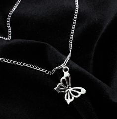 Handmade Antique Silver Butterfly pendant necklace with chain. This dainty necklace is something truly lovely you could wear every day. Or show someone special you truly care with this lovely gift. Matching butterfly earrings available from our shop. Made with  ⭐ Antique Silver Butterfly charm (measures 20x13mm)  ⭐ 18 inch, 20 inch or 22 inch silver plated curb chain   Item will be sent on a decorative card and wrapped in tissue paper before posting Please do not wear this necklace while showeri Butterfly Pendant Necklace, Silver Butterfly, Butterfly Charm, Butterfly Earrings, Butterfly Pendant, Dainty Necklace, Curb Chain, Lovely Gift, Antique Silver