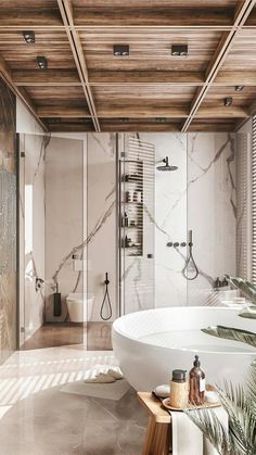 a large white bath tub sitting under a wooden ceiling