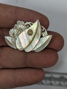 Vintage mother of pearl carved flower, turned into a brooch pin.  Great piece of jewelry for anyone. If you have questions please ask. Combined shipping is offered. Handmade Flower Brooches For Collectors, Unique Flower Brooches For Jewelry Making, Pearl Flowers, Pin Badges, Mother Of Pearl, Favorite Jewelry, Brooch Pin, Brooches, Accessory Gift