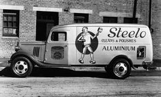 an old truck is parked in front of a brick building with the words steelo cleaning and polishes on it